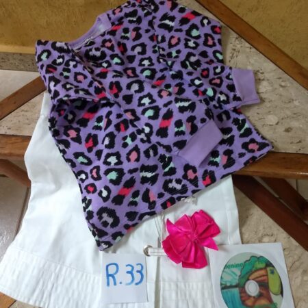 R-33: FEMININO: saia de brim; agasalho de moleton; (Para crianças de 6 anos)