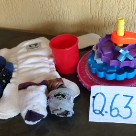 Q-63: MASCULINO: 2 fraldas ecológicas; 3 pares de meias; kit praia